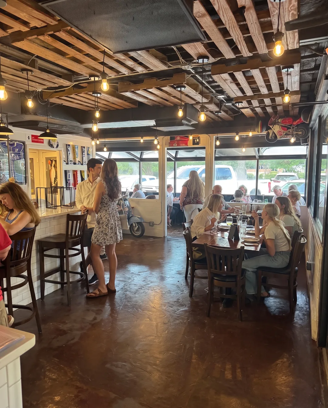 The window side of the dining room, tables full at lunch